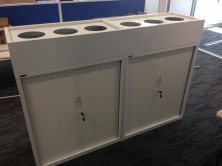 Photo Shows Tambour Door Cupboard With Planter Box On Top. White